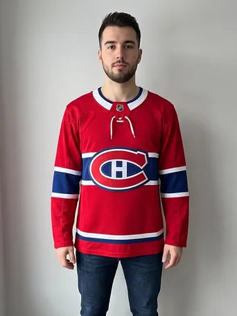The same jersey one size smaller: closer to the body and a little shorter.